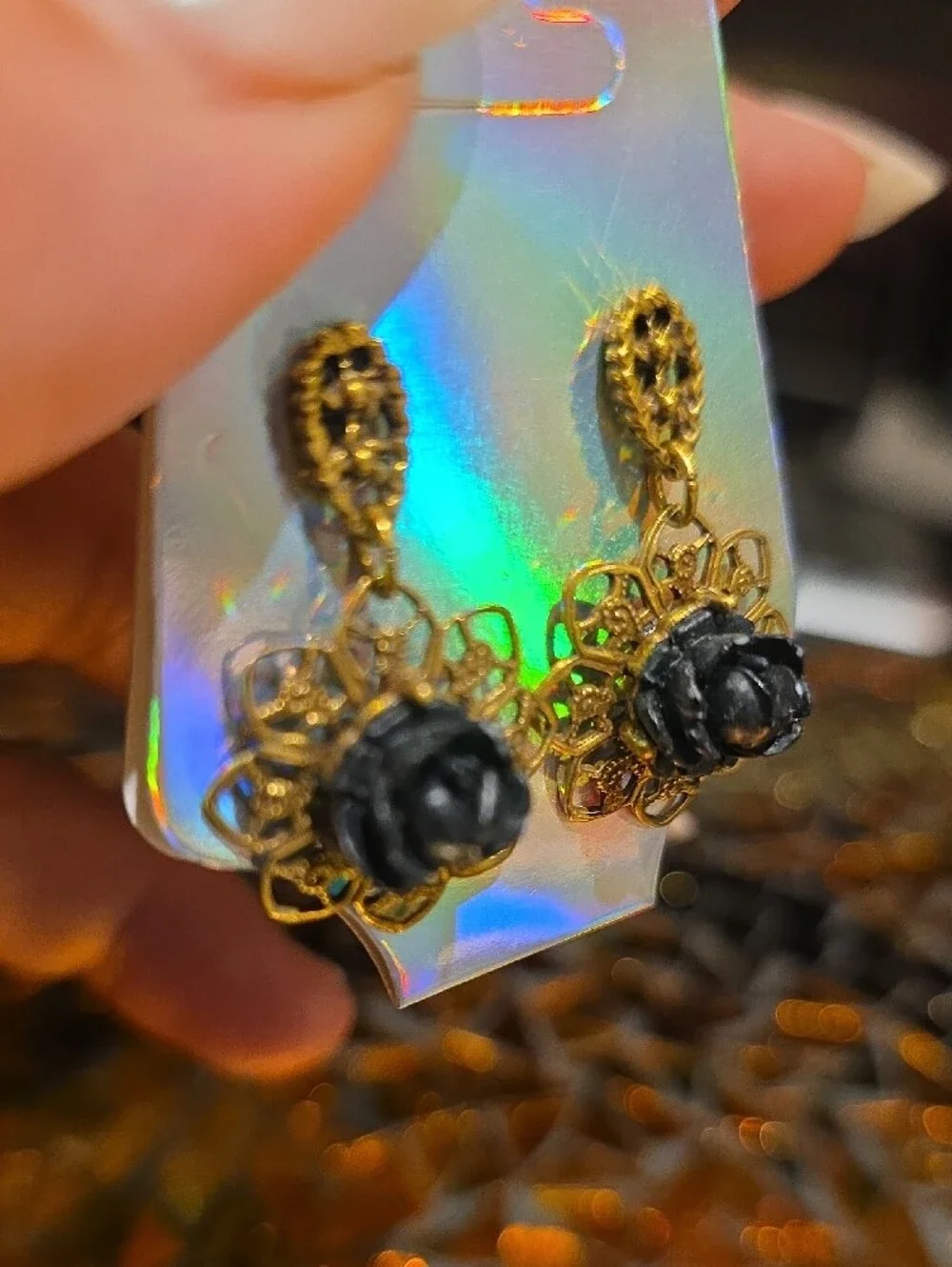 Gold Filigree Drop Earrings with Black Rose Accent